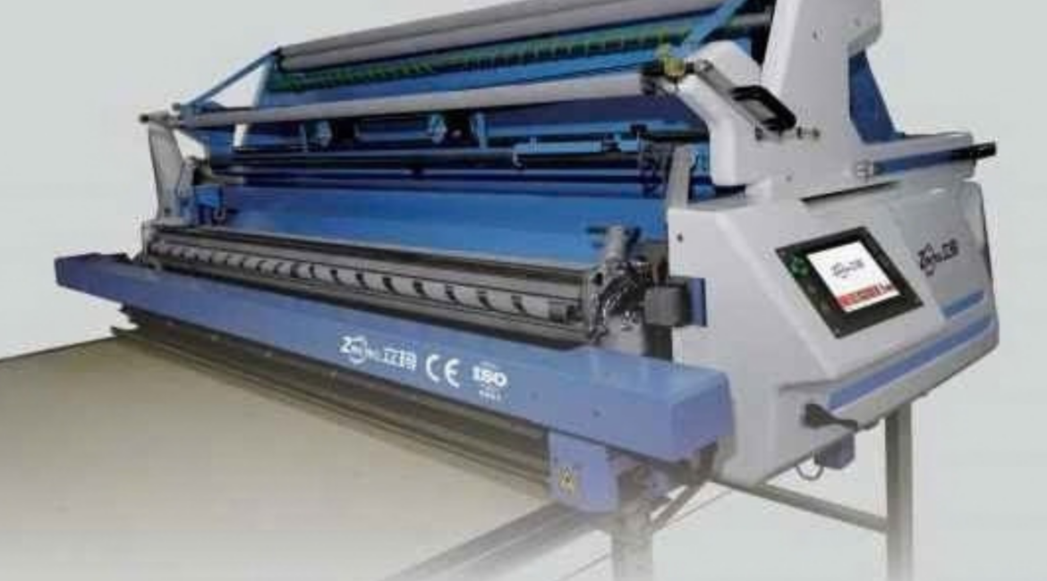 máy trải vải tự động k10 tại Hà Nội - Giải pháp tối ưu chi phí và năng suất cho xưởng may 1 Tìm hiểu máy trải vải tự động k10 tại Hà Nội. Thiết bị giúp xưởng may xả vải không sức căng, căn biên chuẩn xác, tiết kiệm nhân công